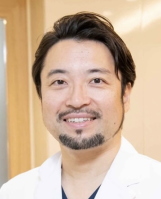 間所睦